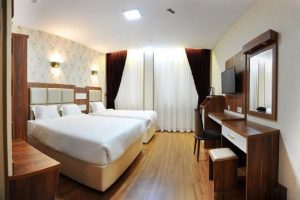 Amatis Triple Room